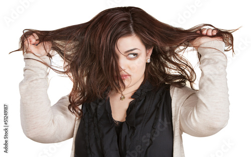 Photo: Woman Pulling Messy Hair Woman Pulling Messy Hair