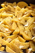 Raw potatoes with spices ready to be roasted