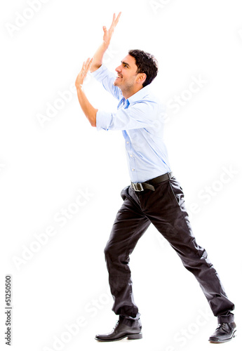 Photo: Business man lifting something Business man lifting something