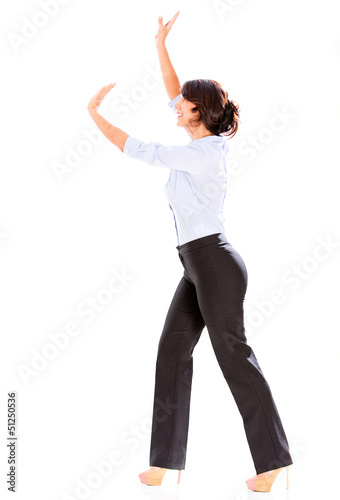 Photo: Business woman lifting something Business woman lifting something