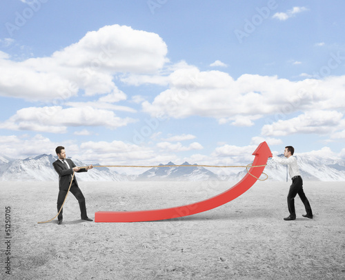 Photo: two man pulling a rope red arrow on nature backgrounâ two man pulling a rope red arrow on nature backgrounâ