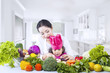 Asian mother teach daughter cook at home
