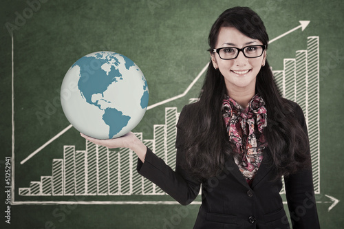 Photo: Businesswoman hold global profit Businesswoman hold global profit