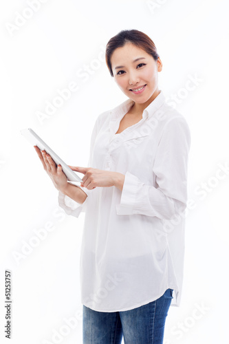 Photo: Woman holding tablet computer. Woman holding tablet computer.
