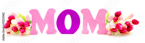 Photo: Mothers Day flowers with foam letters spelling MOM Mothers Day flowers with foam letters spelling MOM