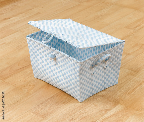 Photo: Weaved plastic basket with a lid and handles Weaved plastic basket with a lid and handles