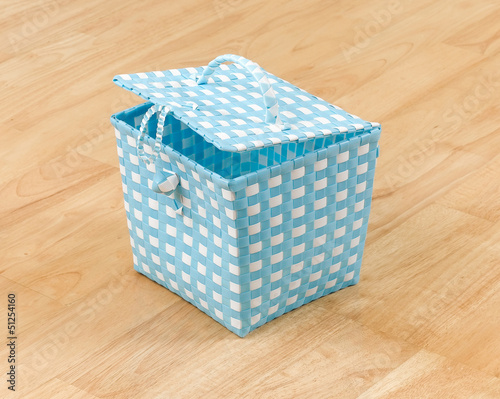 Photo: Weaved plastic baskets with a lid for storage stuff or laundry Weaved plastic baskets with a lid for storage stuff or laundry