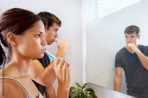 Photo: brushing teeth couple brushing teeth couple