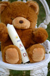 Teddy mit Taufkerze