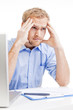 young man at office thinking