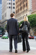 Photo: Businessman And Businesswoman In Street With Takeaway Coffee Businessman And Businesswoman In Street With Takeaway Coffee