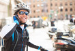 Photo: Young Male Cyclist Talking On Cell Phone Young Male Cyclist Talking On Cell Phone