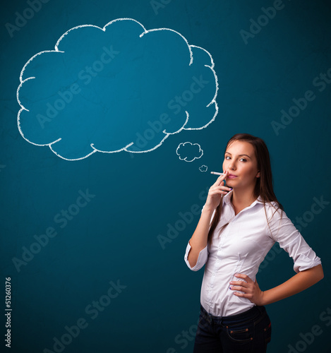 Photo: Beautiful lady smoking cigarette with idea cloud Beautiful lady smoking cigarette with idea cloud