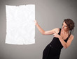 Young girl holding crumpled white paper copy space