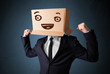 Businessman gesturing with a cardboard box on his head with smil