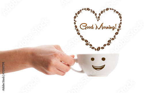 Photo: Coffee mug with coffee beans shaped heart with good morning sign Coffee mug with coffee beans shaped heart with good morning sign