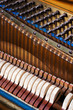 Inside an Upright Piano. Felt Hammers used to strike Steel