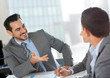 Businessman presenting contract to partners