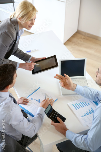 Photo: Executive woman making business presentation Executive woman making business presentation