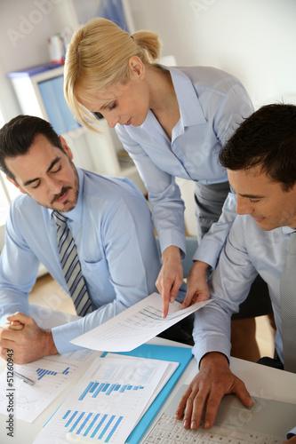 Photo: Corporate woman presenting results to sales team Corporate woman presenting results to sales team