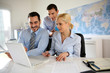 Business people meeting in office with laptop