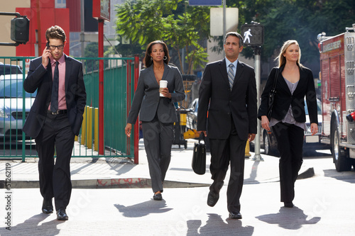 Photo: Group Of Businesspeople Crossing Street Group Of Businesspeople Crossing Street