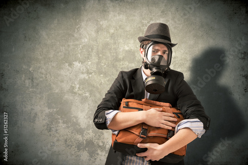 Photo: Young man with gas mask Young man with gas mask