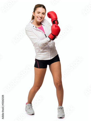 Photo: Young Woman With Boxing Glove Young Woman With Boxing Glove