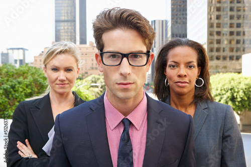 Photo: Portrait Of Three Business Colleagues Outside Office Portrait Of Three Business Colleagues Outside Office