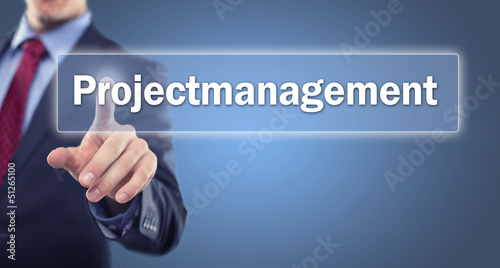 Photo: Man touching Display Projectmanagement Man touching Display Projectmanagement