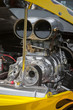 blower supercharger in a dragster engine bay
