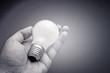 Background with lit lightbulb