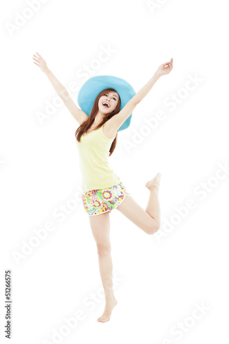 Photo: happy young woman dancing in summer during vacation isolated on happy young woman dancing in summer during vacation isolated on