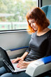 Photo: Woman is sitting in the train Woman is sitting in the train