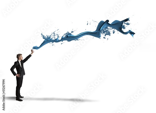 Photo: Businessman paint with spray Businessman paint with spray