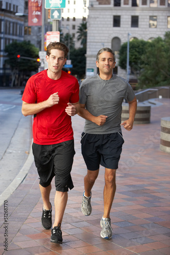 Photo: Two Men Running On Urban Street Two Men Running On Urban Street