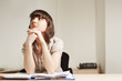 Young businesswoman with papers