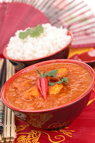 Photo: bowl of curry chicken and rice bowl of curry chicken and rice