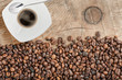 Foto: coffee beans with cup of coffee coffee beans with cup of coffee
