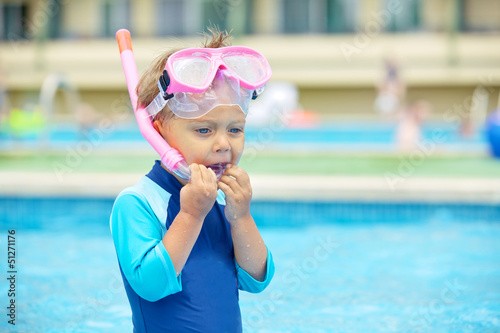 Photo: Boy wearing a mask for diving Boy wearing a mask for diving