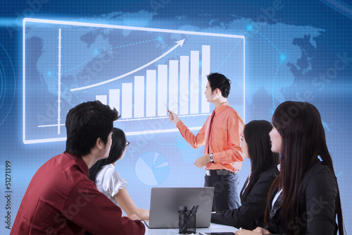 Photo: Business presentation with touchscreen chart Business presentation with touchscreen chart