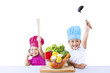 Happy chef kids with vegetable