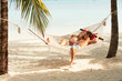 Romantic Couple Relaxing In Be...