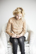 Blonde Young Woman with Beautiful Blue Eyes Writing in Her Journ