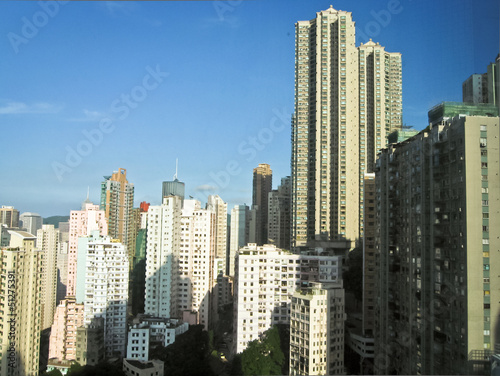 Photo: Skyscrapers in Hong Kong with sun Skyscrapers in Hong Kong with sun