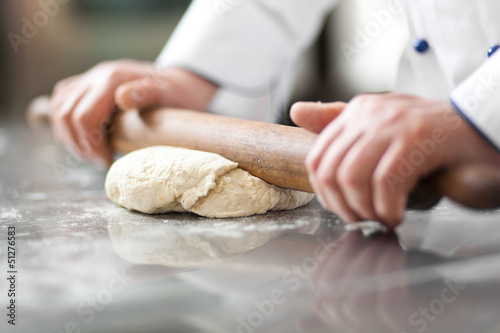Photo: Chef preparing dough in a kitchen Chef preparing dough in a kitchen