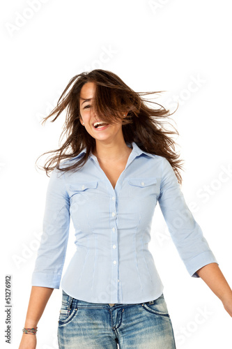 Photo: young woman dancing in studio, isolated on white background young woman dancing in studio, isolated on white background