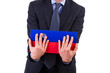 Businessman holding folders.