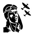 Pilot with aviator helmet and glasses watching airplanes.
