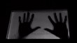 trapped man hands knocking on door